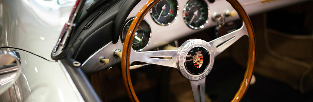 steering wheel of a classic Porsche car